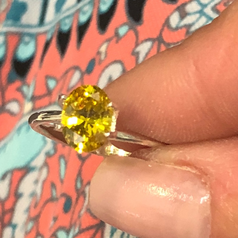 Loose Oval yellow cz. Approximately 1ct.